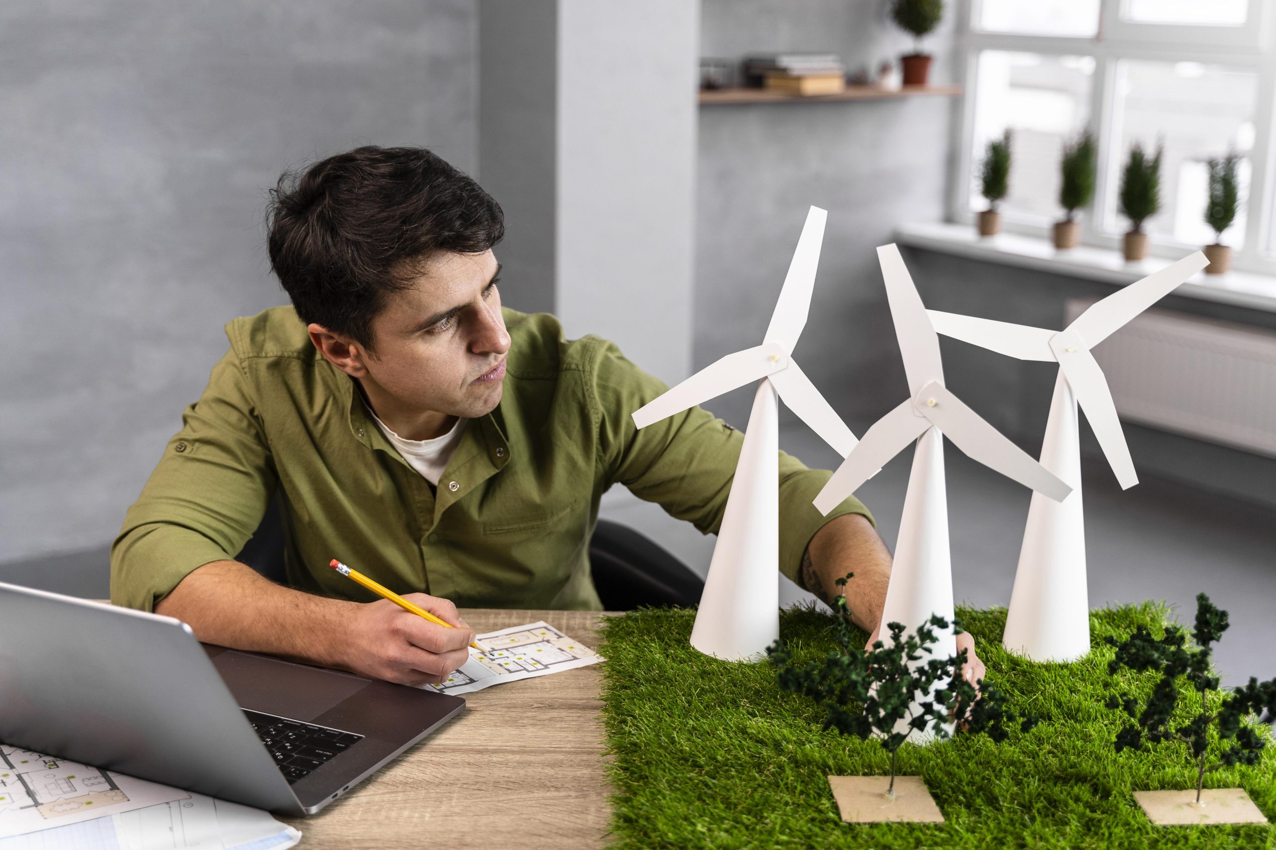 high angle man working eco friendly wind power project